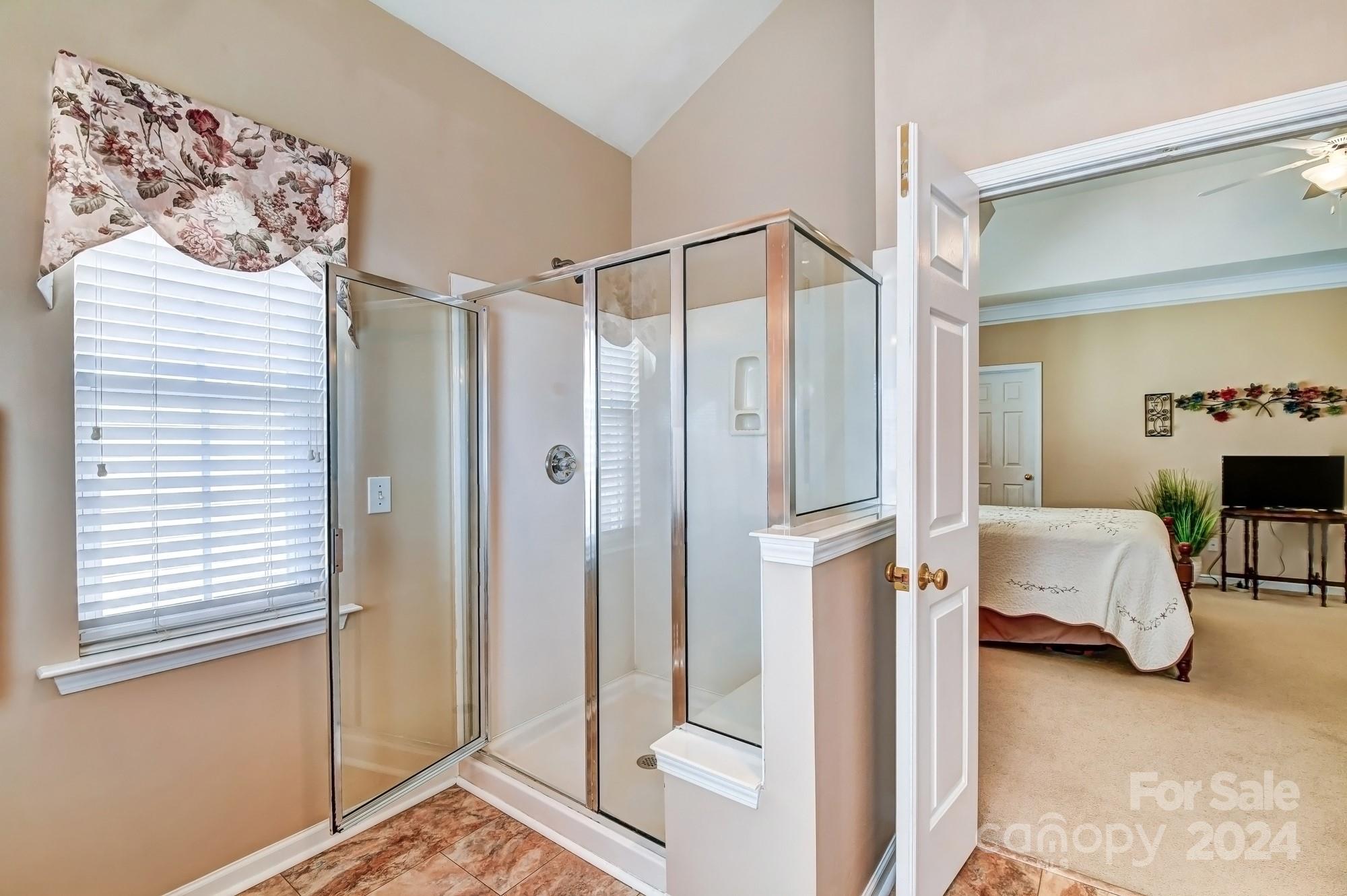 182 Harris Farm Road Mooresville, NC 28115 - Photo 31 of 46 a en suite bathroom with a shower and a sink