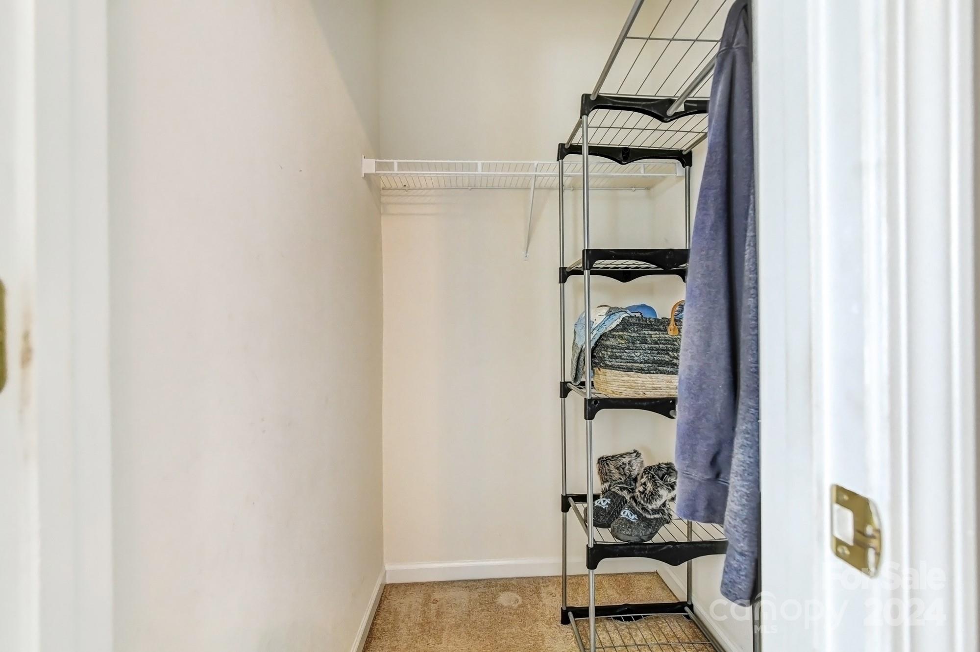 182 Harris Farm Road Mooresville, NC 28115 - Photo 35 of 46 a room with table and hallway