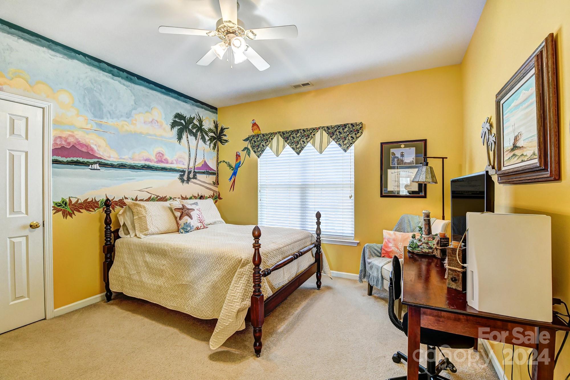 182 Harris Farm Road Mooresville, NC 28115 - Photo 38 of 46 a bedroom with a bed and wooden floor