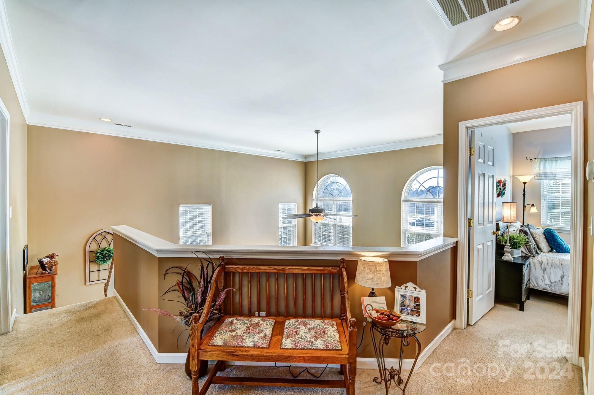 182 Harris Farm Road Mooresville, NC 28115 - Photo 41 of 46 a view of a livingroom with furniture and windows