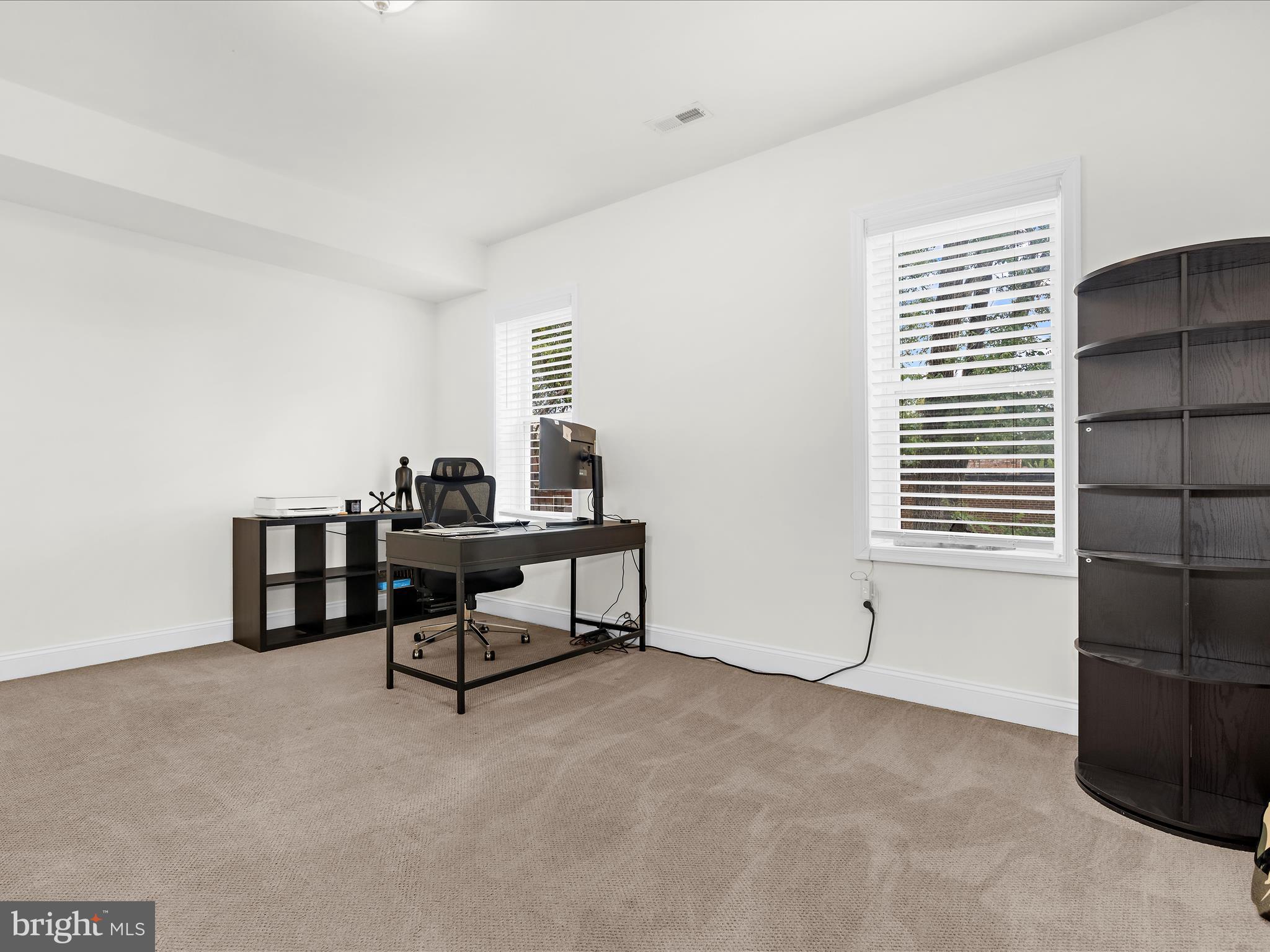 505 Mosher Street Baltimore, MD 21217 - Photo 14 of 46 a living room with furniture and a window