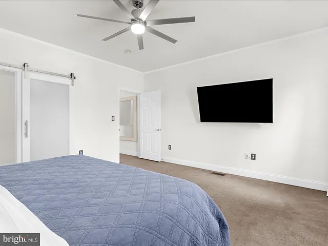 a view of a livingroom with a flat screen tv