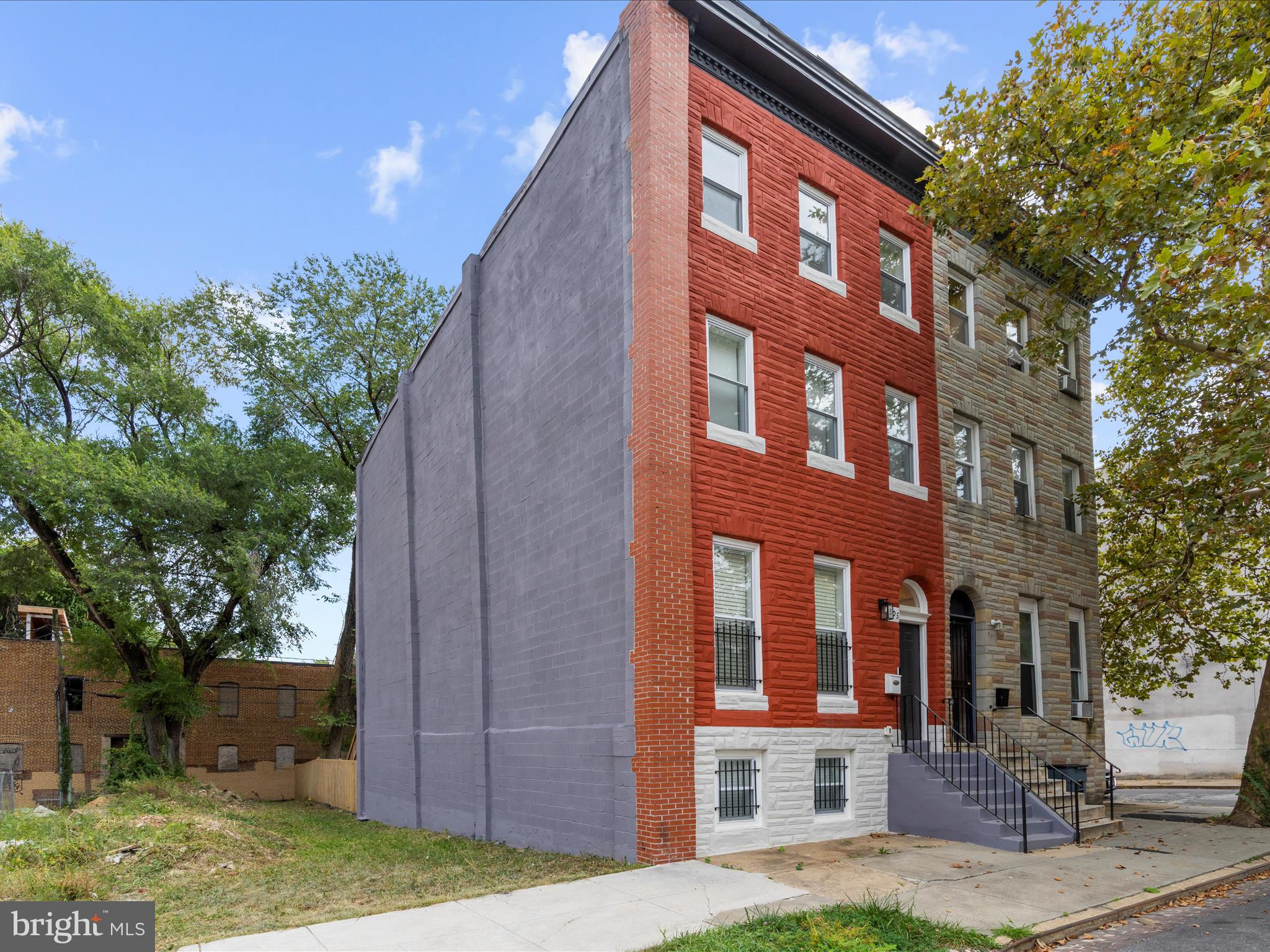 505 Mosher Street Baltimore, MD 21217 - Photo 2 of 46 a front view of a building with garden