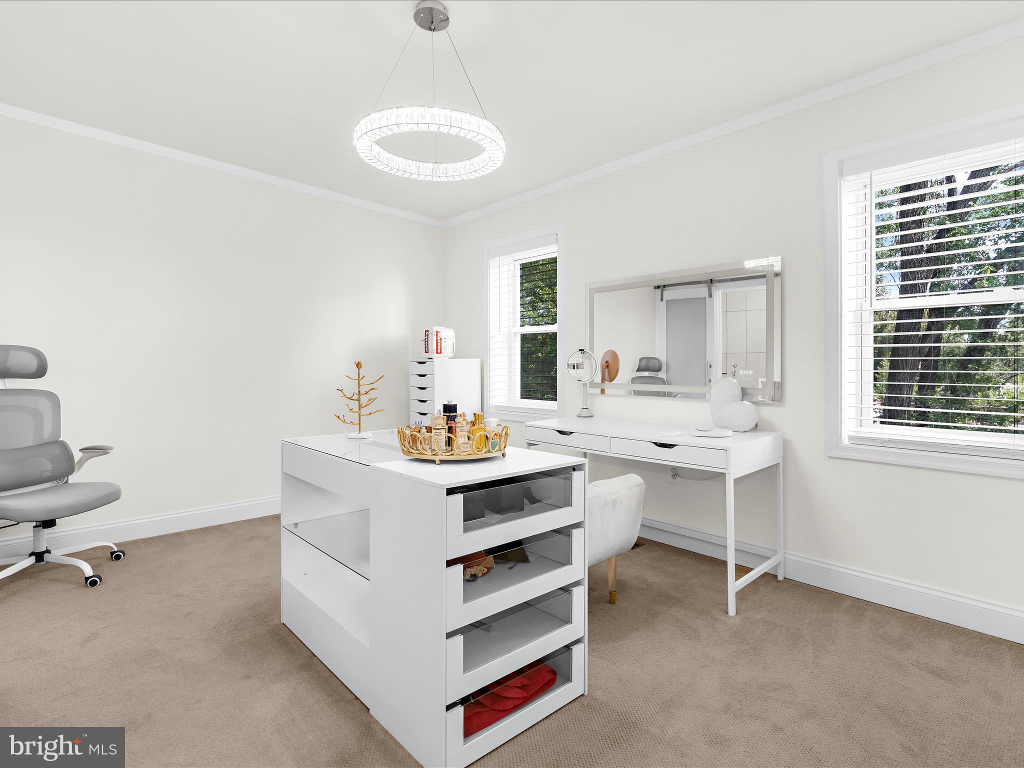 505 Mosher Street Baltimore, MD 21217 - Photo 24 of 46 a room with a desk chairs and chandelier