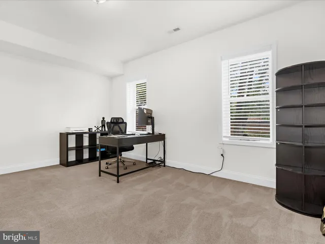 a view of workspace with a cabinet