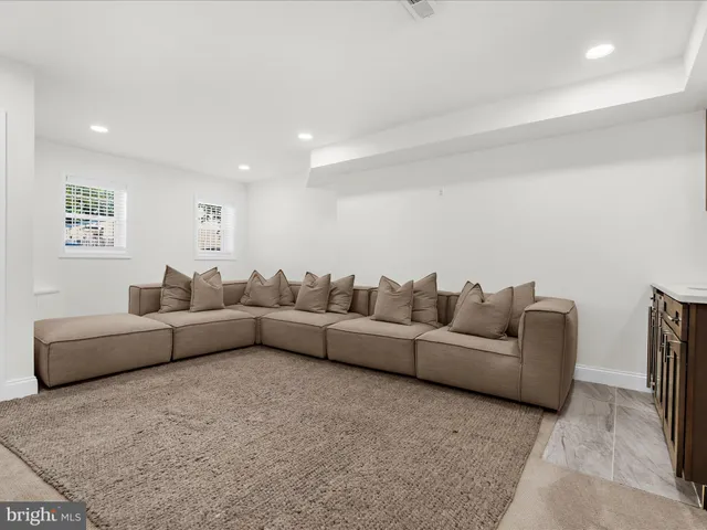 a living room with furniture and a couch