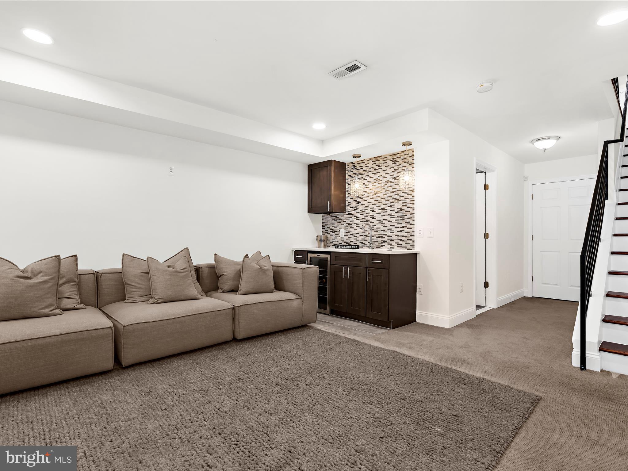 505 Mosher Street Baltimore, MD 21217 - Photo 34 of 46 a living room with furniture and a couch