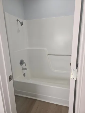 a bathroom with a bathtub