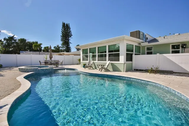 a swimming pool with outdoor view