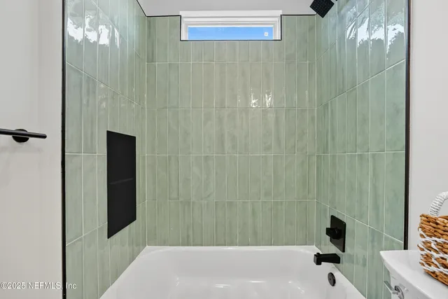 a view of an outdoor space with garden and seating area