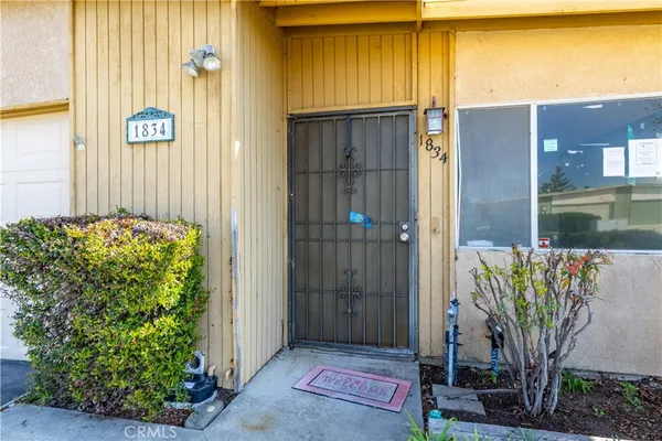 a front view of a house with a glass door