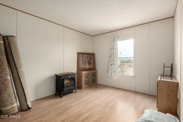 a view of workspace with furniture and window