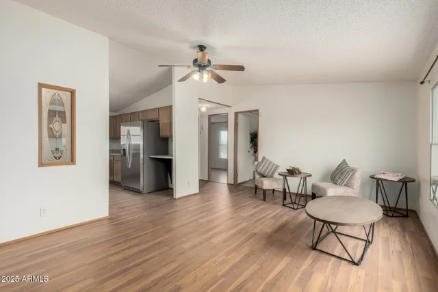 a view of a livingroom with furniture and wooden floor