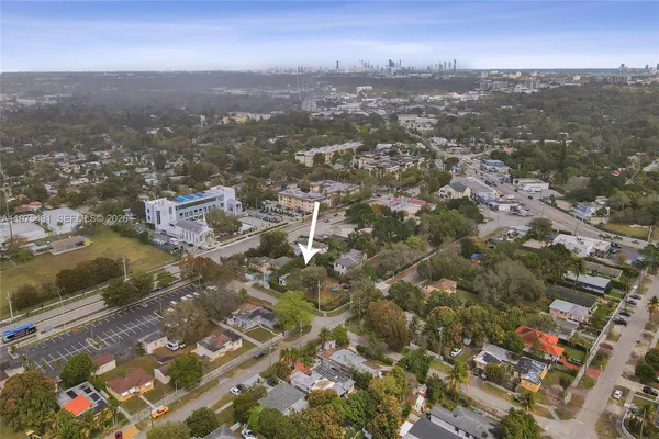an aerial view of residential building with parking space
