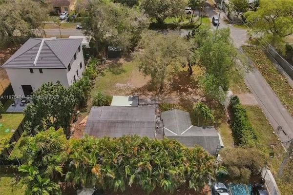 an aerial view of a house with a garden