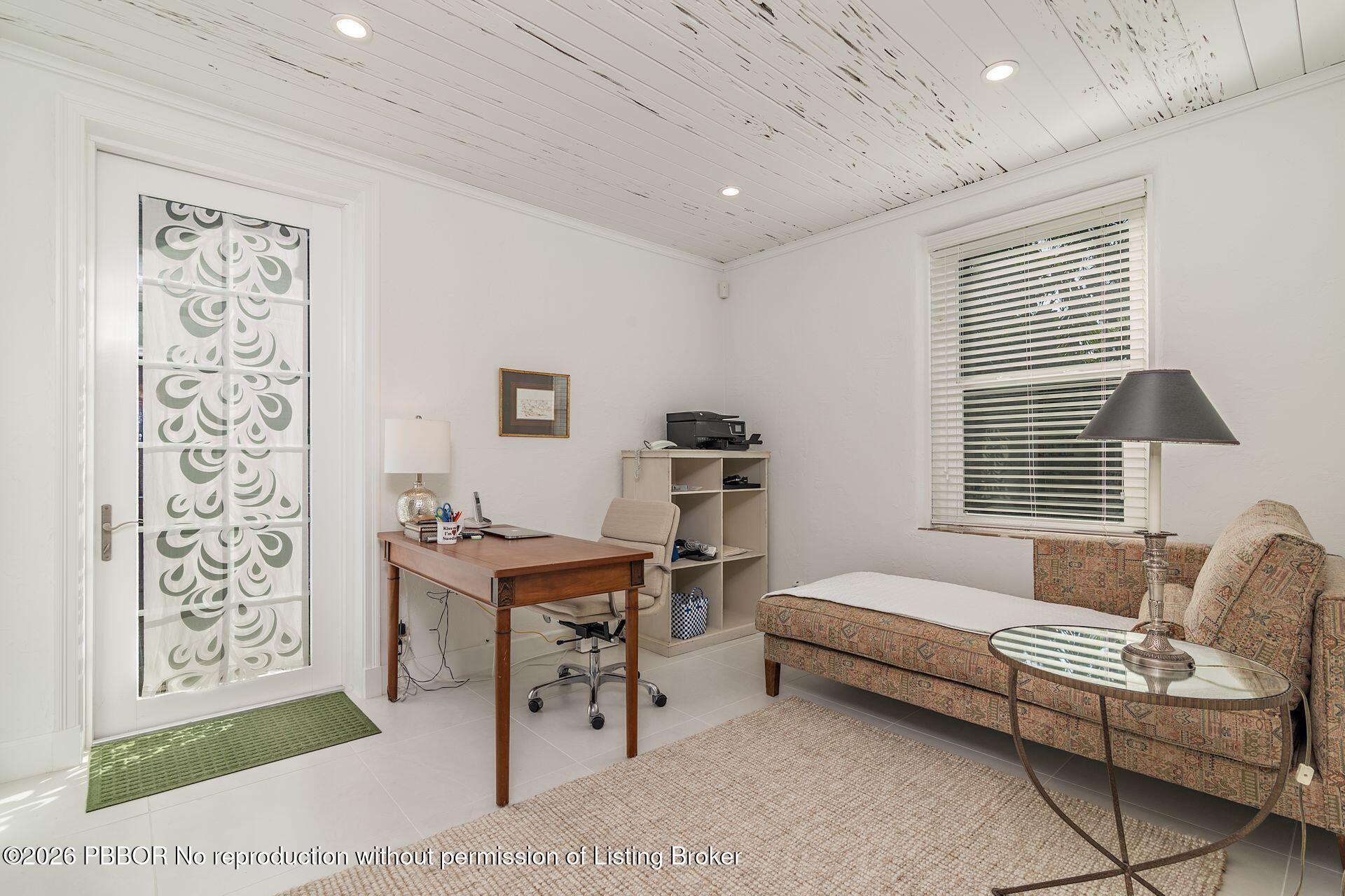 224 Churchill Road West Palm Beach, FL 33405 - Photo 18 of 33 a bedroom with furniture and a window