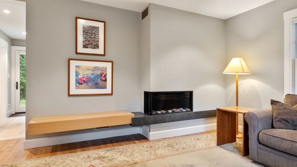 23 Colgate Road Wellesley, MA 02482 - Photo 13 of 32 a living room with furniture and a flat screen tv