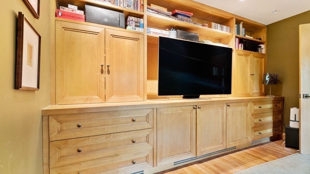 23 Colgate Road Wellesley, MA 02482 - Photo 15 of 32 a bathroom with a sink a mirror and a shower