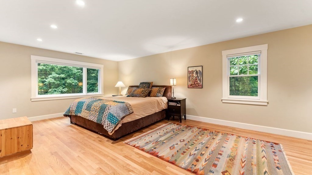 23 Colgate Road Wellesley, MA 02482 - Photo 19 of 32 a bedroom with a large bed and a window