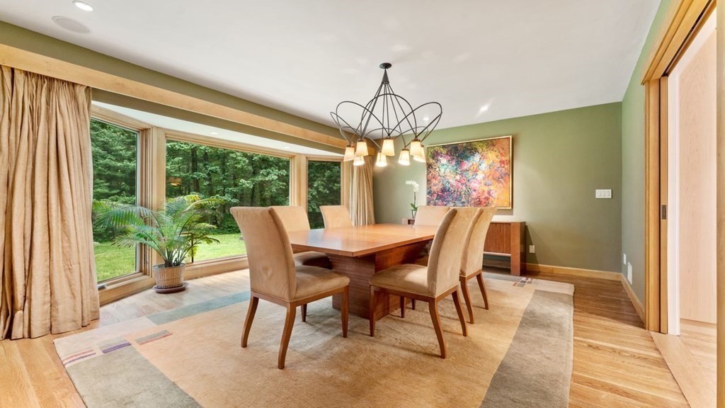 23 Colgate Road Wellesley, MA 02482 - Photo 8 of 32 a view of a dining room with furniture window and wooden floor
