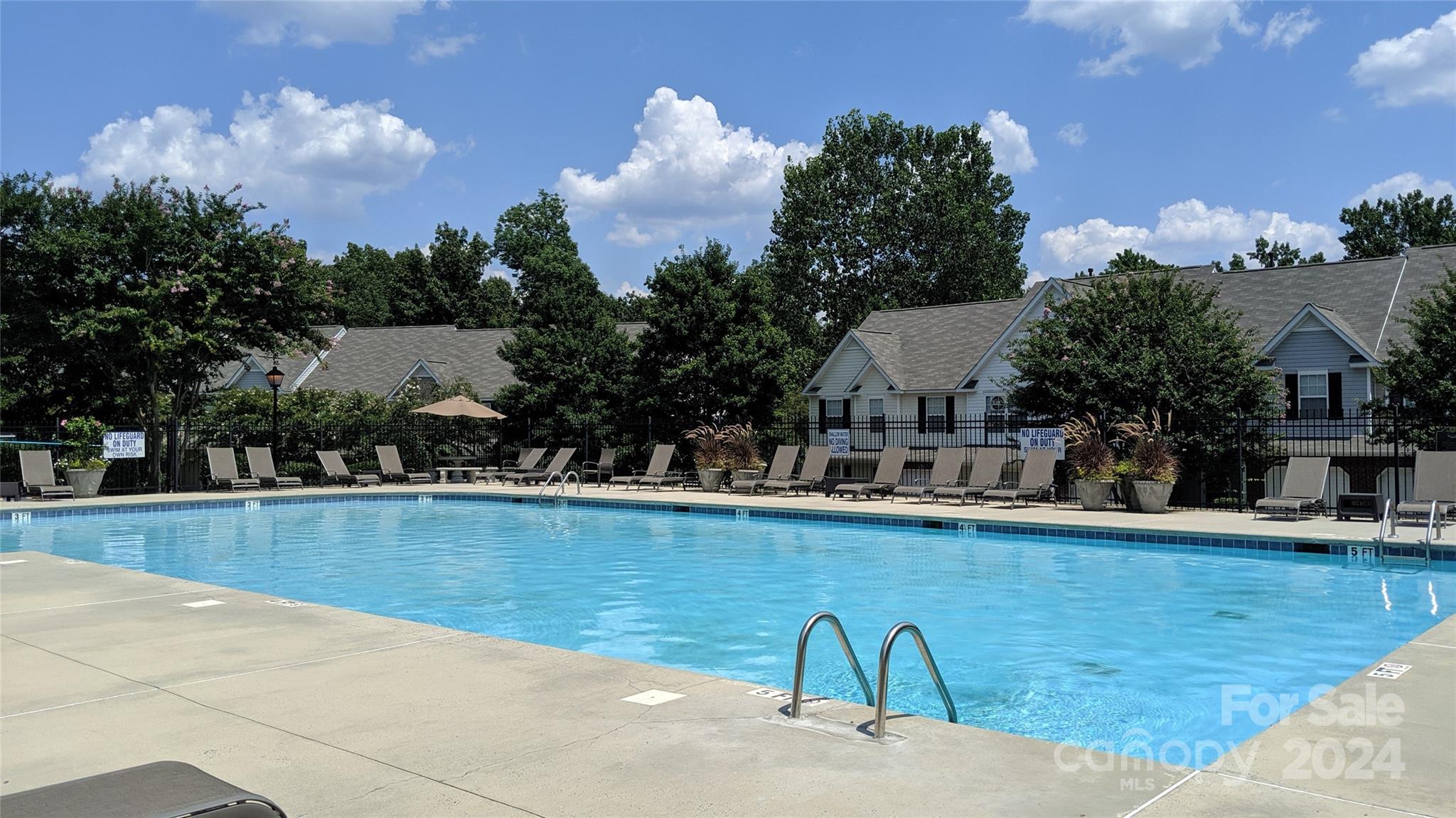 1681 Alpine Ridge Place Rock Hill, SC 29732 - Photo 17 of 20 a view of a swimming pool with a yard