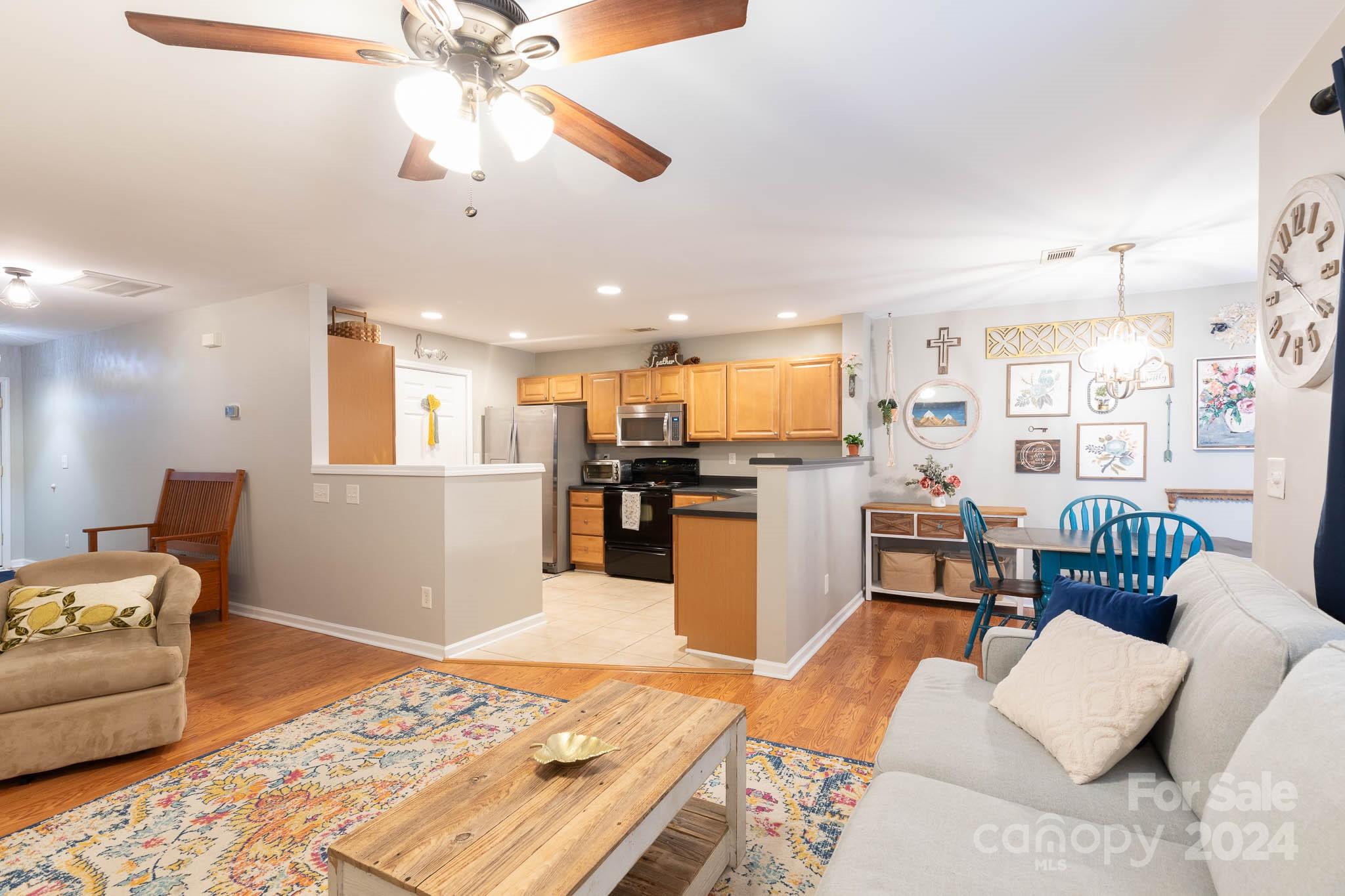 1681 Alpine Ridge Place Rock Hill, SC 29732 - Photo 4 of 20 a living room with furniture and kitchen view
