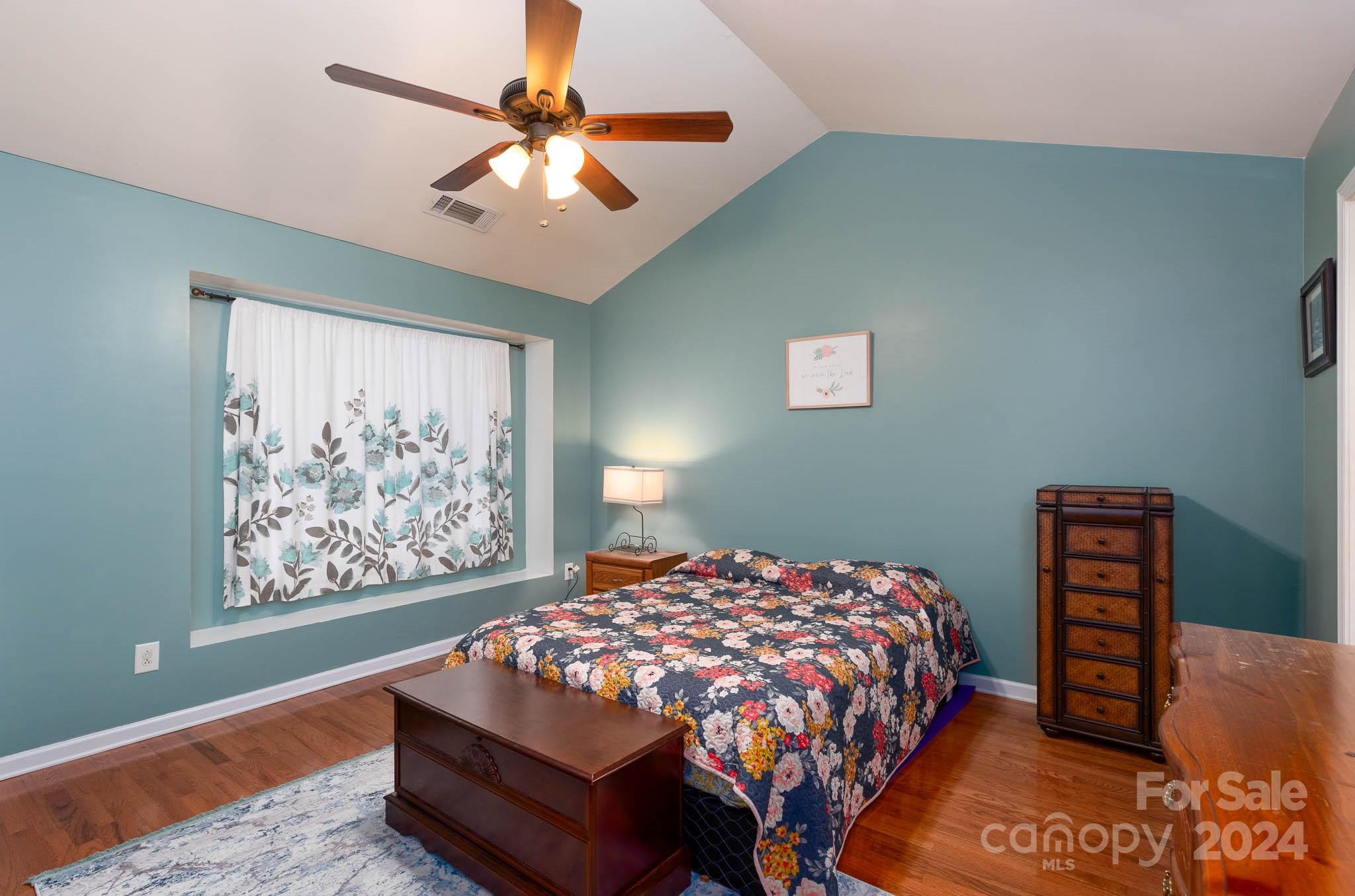1681 Alpine Ridge Place Rock Hill, SC 29732 - Photo 9 of 20 a bedroom with a bed window and a ceiling fan