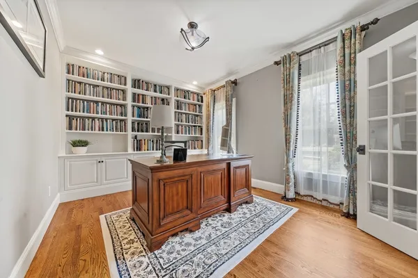a living room with furniture and a rug
