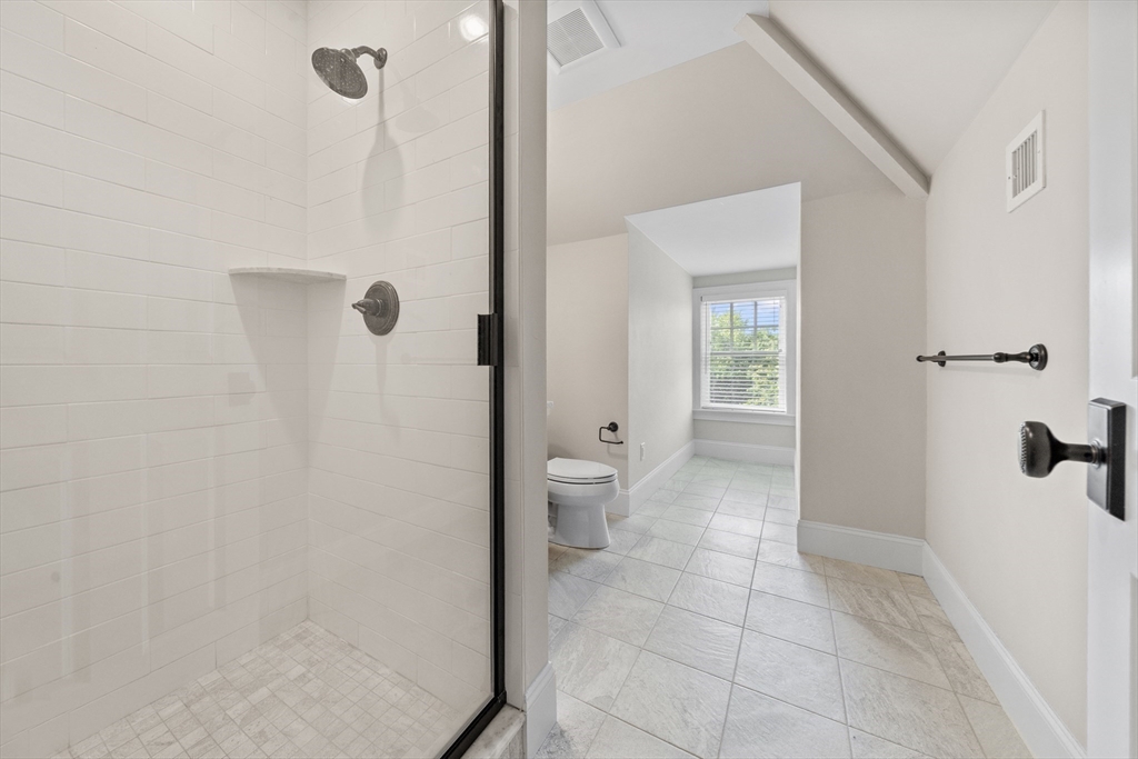18 Victory Garden Way Lexington, MA 02420 - Photo 34 of 42 a bathroom with a shower and a toilet