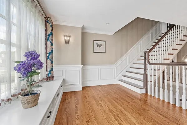 a view of entryway with wooden floor