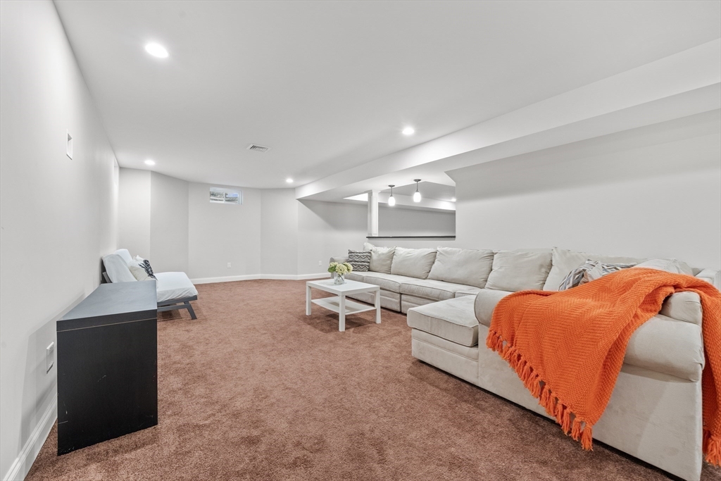 18 Victory Garden Way Lexington, MA 02420 - Photo 36 of 42 a living room with furniture