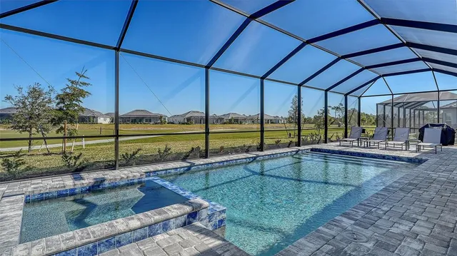 a view of a building with a yard