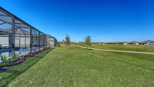 a building outdoor space with patio furniture and potted plants