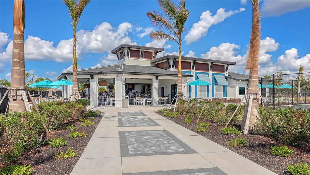 17160 Albatross Road Venice, FL 34293 - Photo 51 of 91 a front view of a house with garden