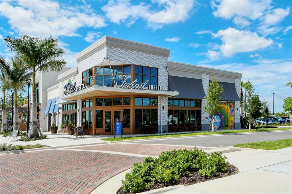 17160 Albatross Road Venice, FL 34293 - Photo 60 of 91 a view of a building with a yard
