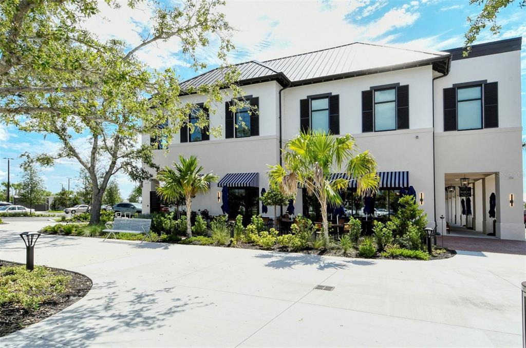 17160 Albatross Road Venice, FL 34293 - Photo 61 of 91 a front view of a house with a yard