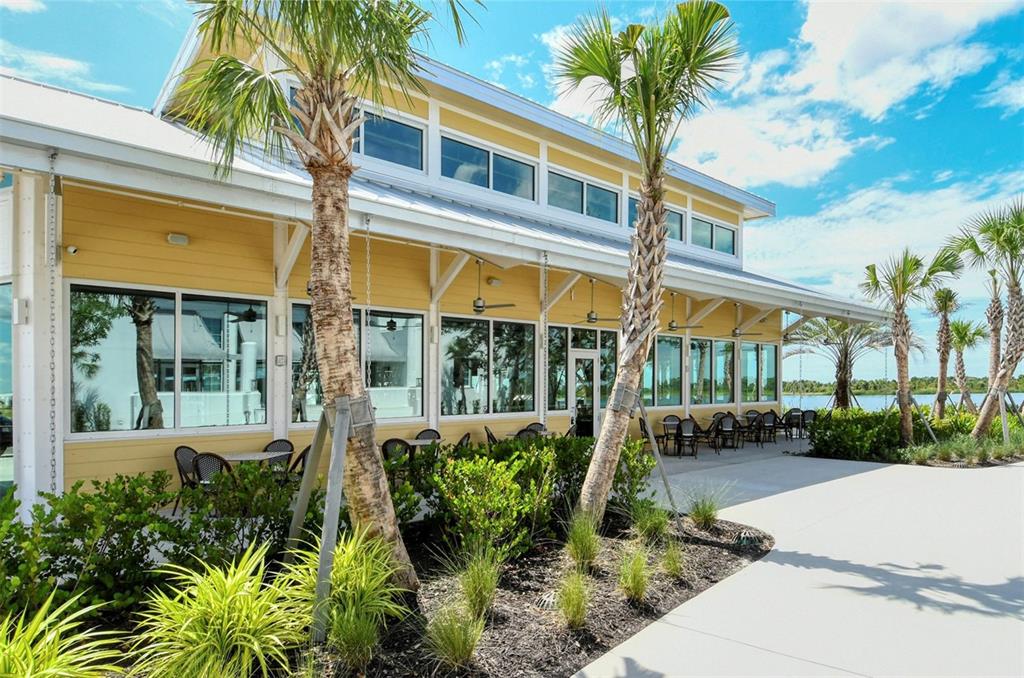 17160 Albatross Road Venice, FL 34293 - Photo 68 of 91 a front view of a house with garden