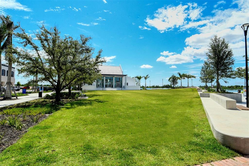 17160 Albatross Road Venice, FL 34293 - Photo 87 of 91 a view of a swimming pool with an outdoor space and seating area