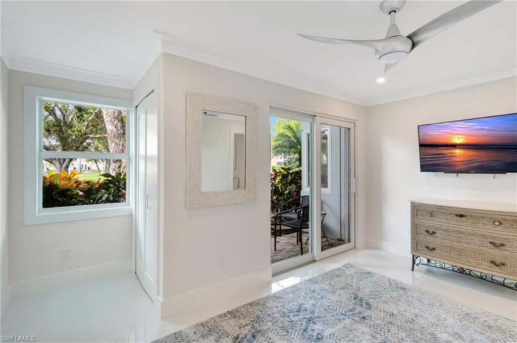 603 12th Avenue South Naples, FL 34102 - Photo 17 of 47 a view of room with window and furniture