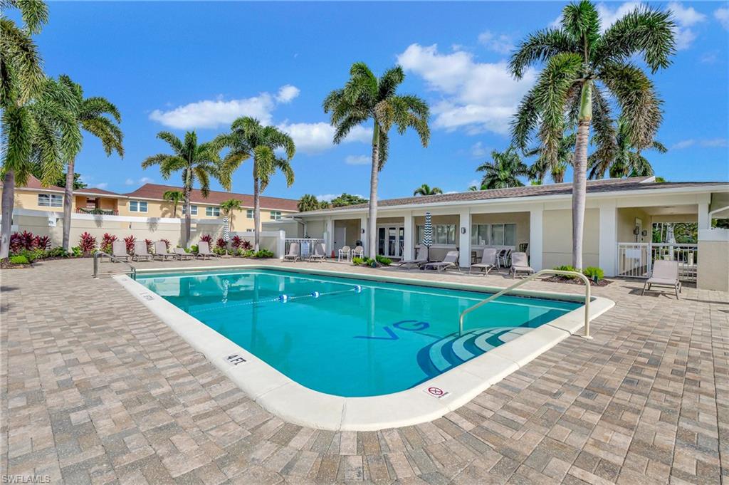 603 12th Avenue South Naples, FL 34102 - Photo 36 of 47 a view of a house with swimming pool