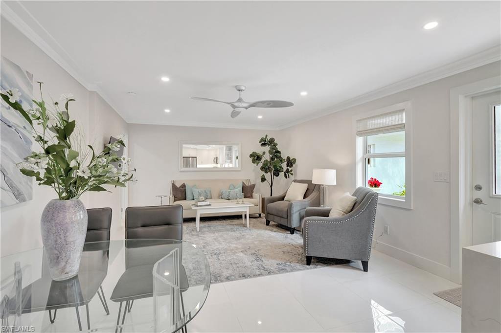 603 12th Avenue South Naples, FL 34102 - Photo 6 of 47 a living room with furniture potted plant and a window