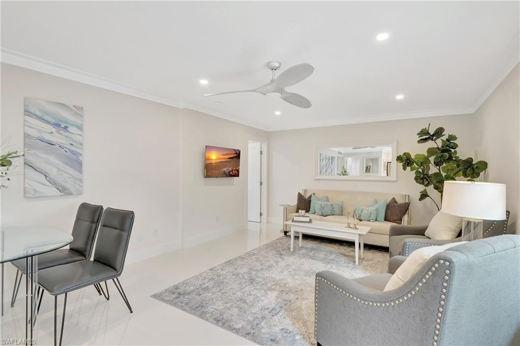 603 12th Avenue South Naples, FL 34102 - Photo 8 of 47 a living room with furniture and a potted plant