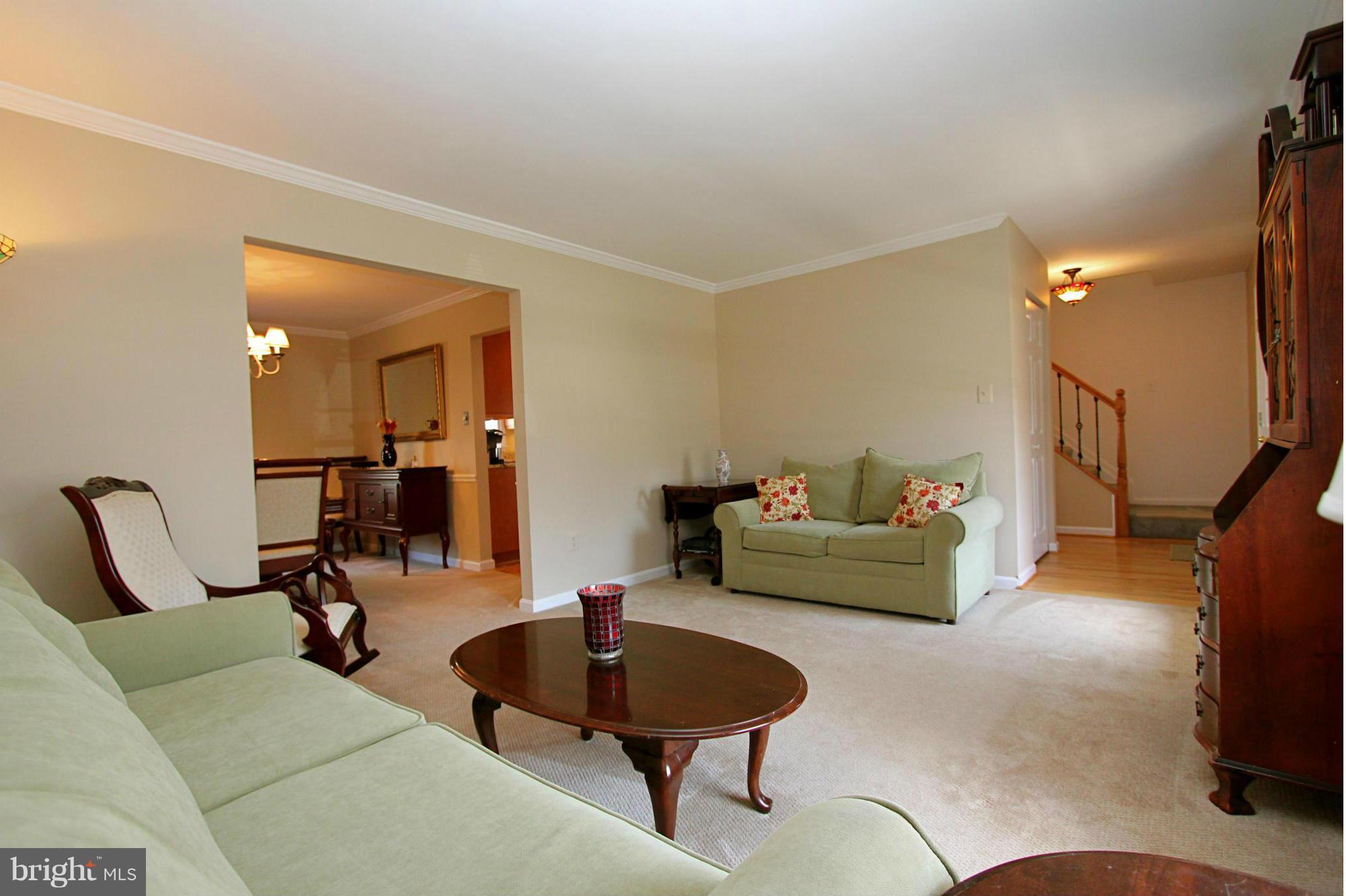 9338 Ramblebrook Road Baltimore, MD 21236 - Photo 3 of 25 a living room with furniture and a couch