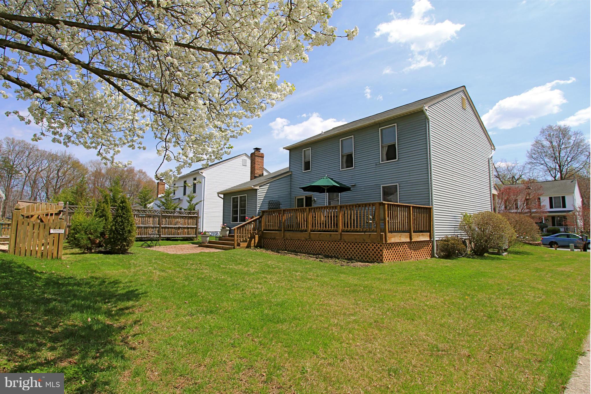 9338 Ramblebrook Road Baltimore, MD 21236 - Photo 21 of 25 a view of a house with a big yard
