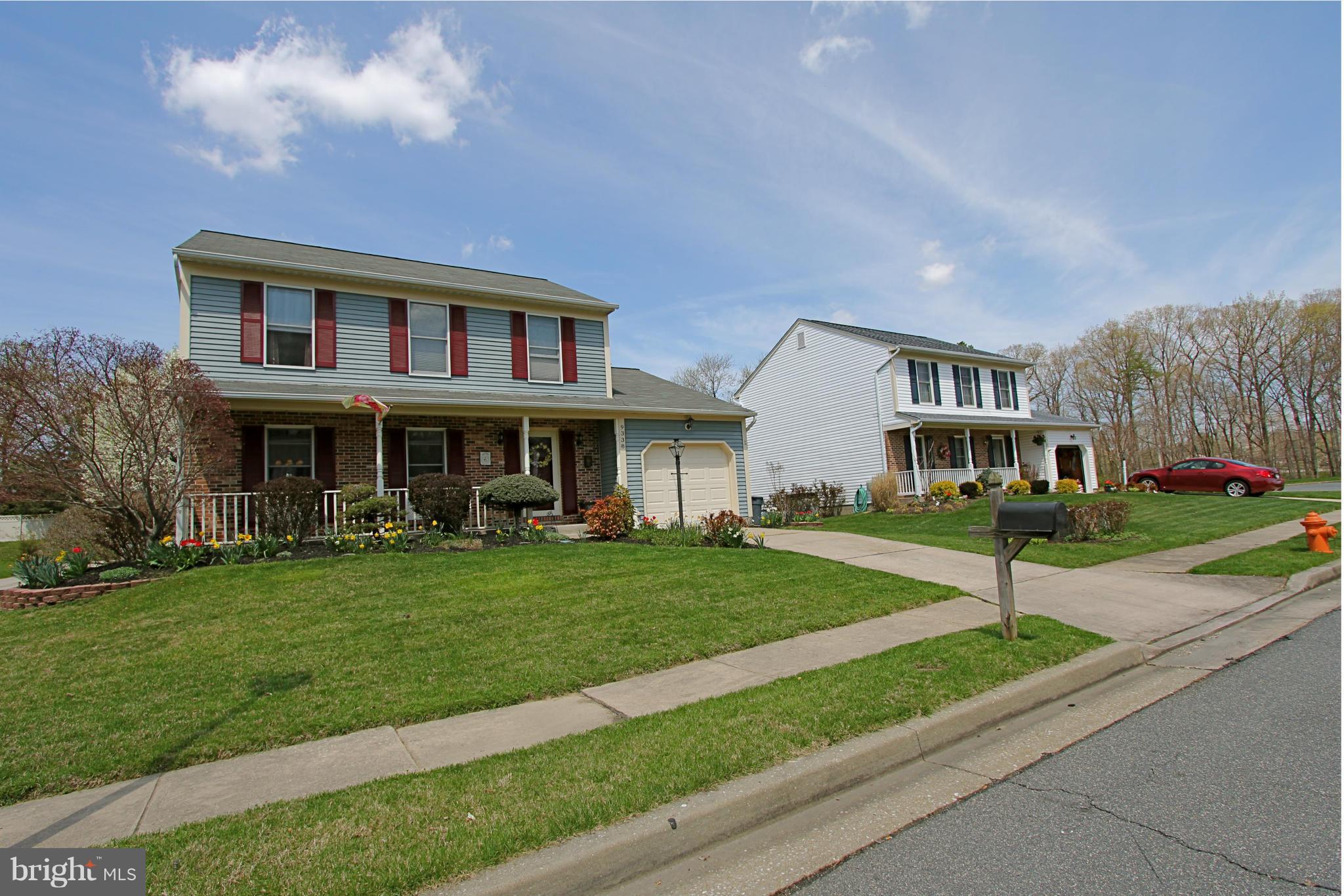 9338 Ramblebrook Road Baltimore, MD 21236 - Photo 25 of 25 a front view of a house with a yard