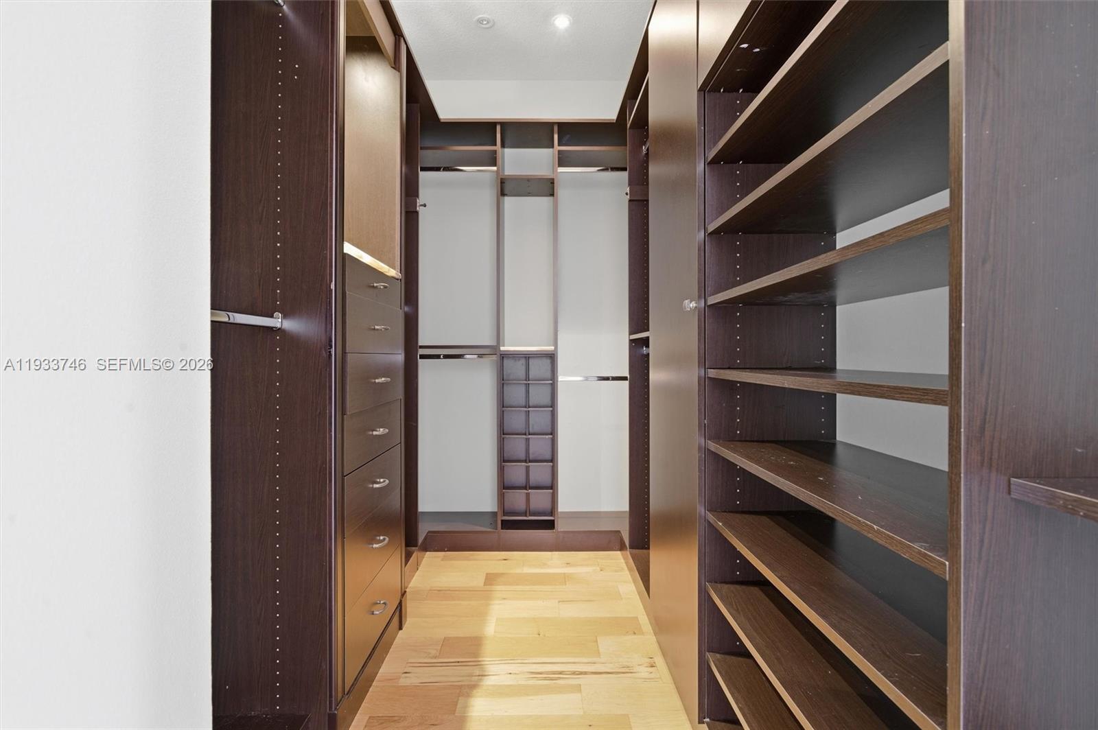 4857 Northwest 16th Terrace Boca Raton, FL 33431 - Photo 13 of 45 a view of walk in closet with empty racks