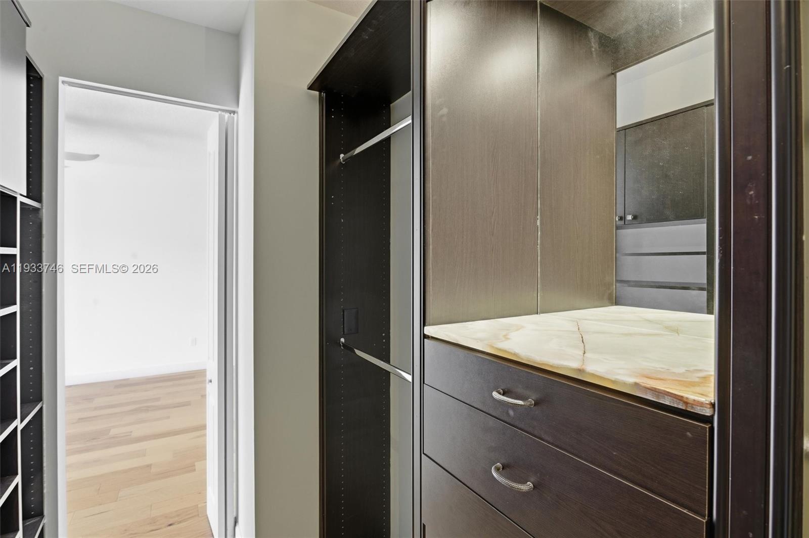 4857 Northwest 16th Terrace Boca Raton, FL 33431 - Photo 14 of 45 a bathroom with a granite countertop sink and a mirror