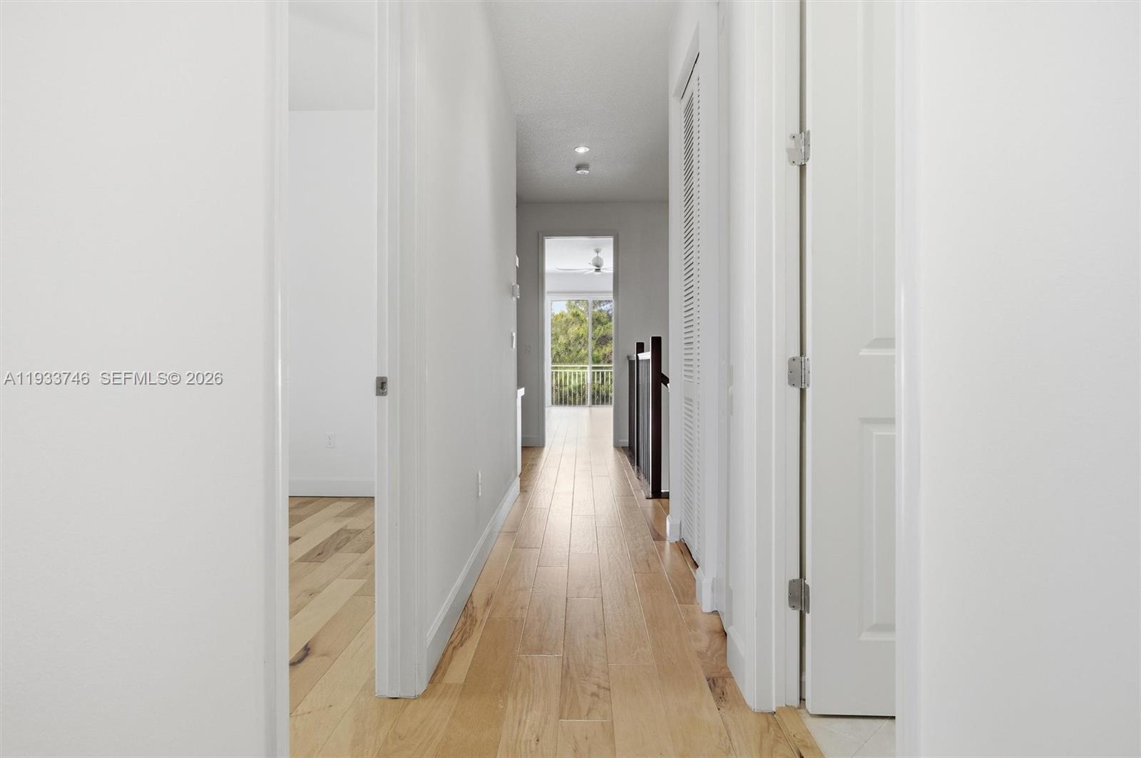 4857 Northwest 16th Terrace Boca Raton, FL 33431 - Photo 31 of 45 a view of a hallway with wooden floor