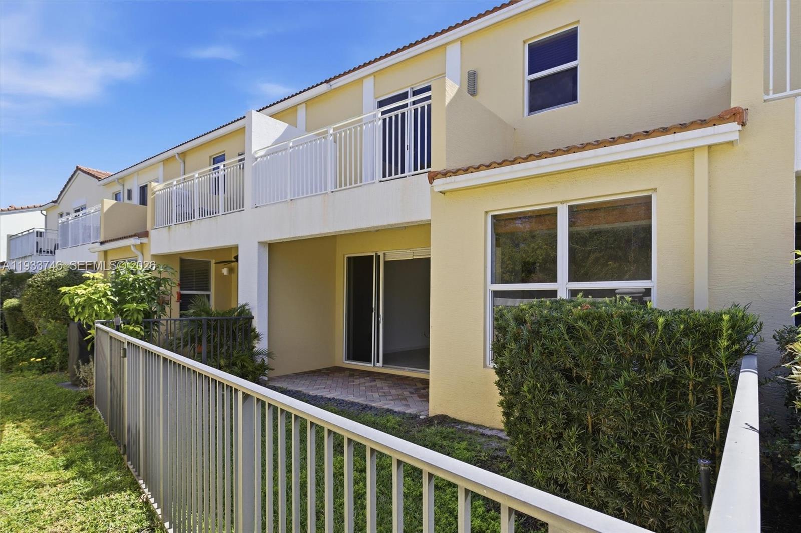 4857 Northwest 16th Terrace Boca Raton, FL 33431 - Photo 36 of 45 a front view of a house with balcony