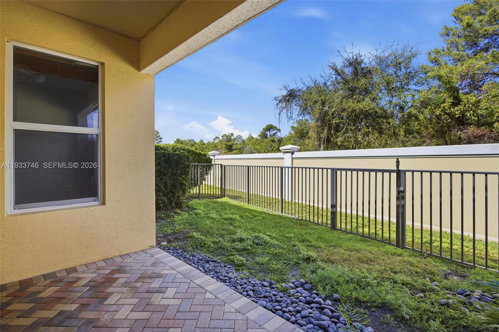 4857 Northwest 16th Terrace Boca Raton, FL 33431 - Photo 39 of 45 a view of a backyard with a garden